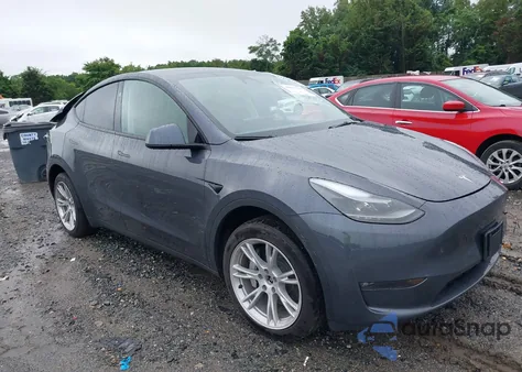 2023 Tesla Model Y Awd/Long Range Dual Motor All-Wheel Drive z USA, uszkodzony, nr VIN 7SAYGDEE5PF895364